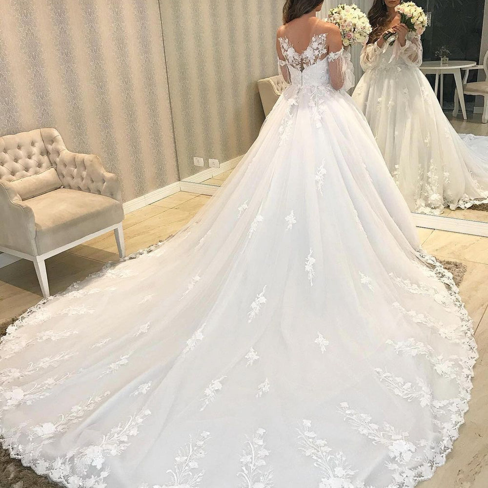 
                      
                        Elegant Long Princess Off-the-Shoulder Wedding Dress with Bubble Sleeves and Tulle
                      
                    