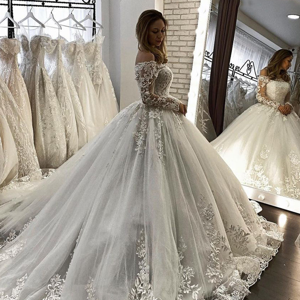 Off-the-Shoulder Long Sleeve Illusion Ball Gown Wedding Dress with Appliques