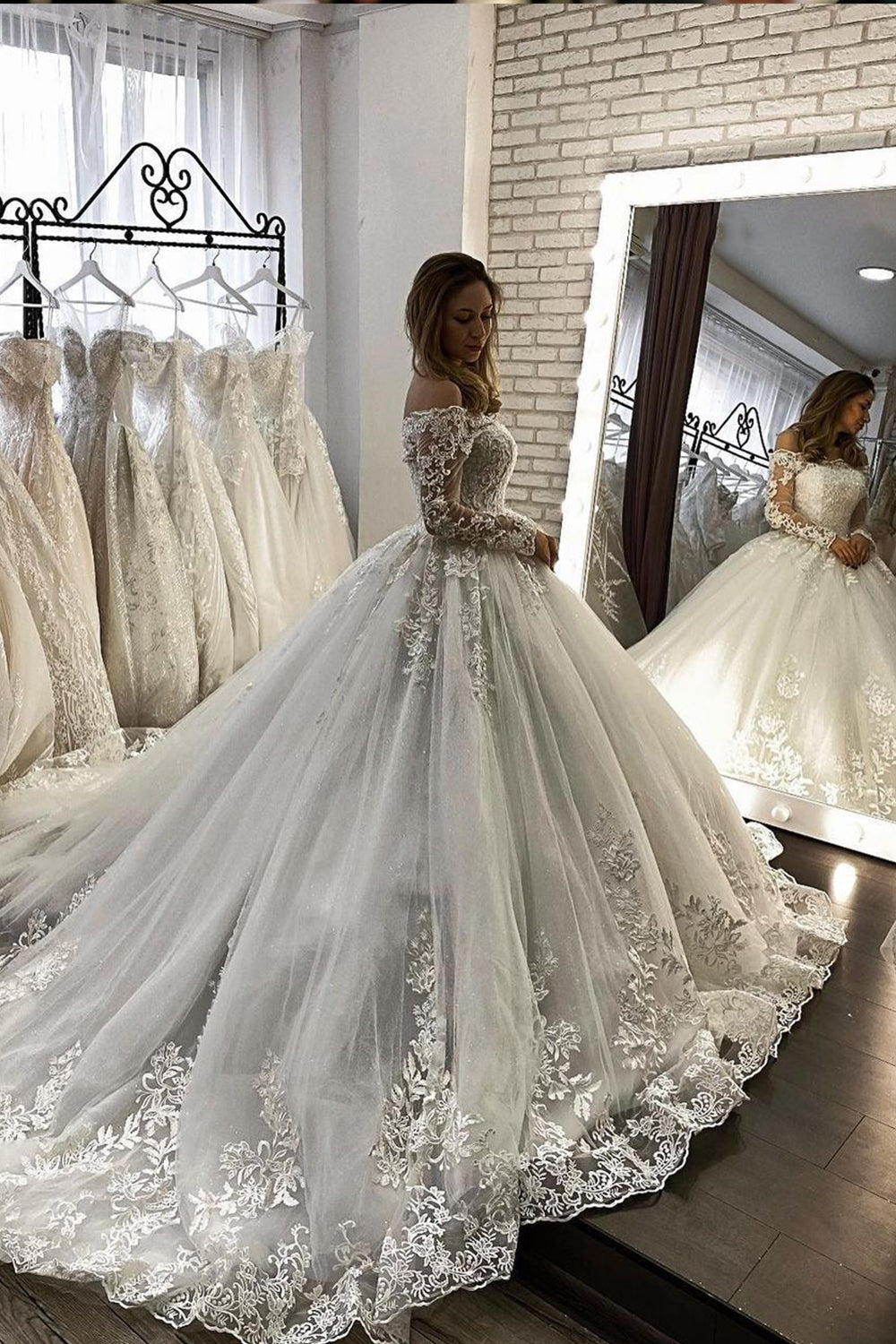 Off-the-Shoulder Long Sleeve Illusion Ball Gown Wedding Dress with Appliques