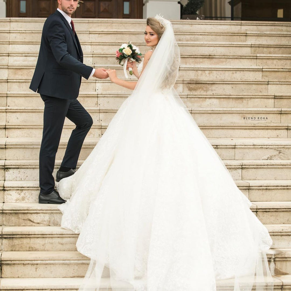 
                      
                        Long Princess V-Neck Wedding Dress with Tulle Lace
                      
                    