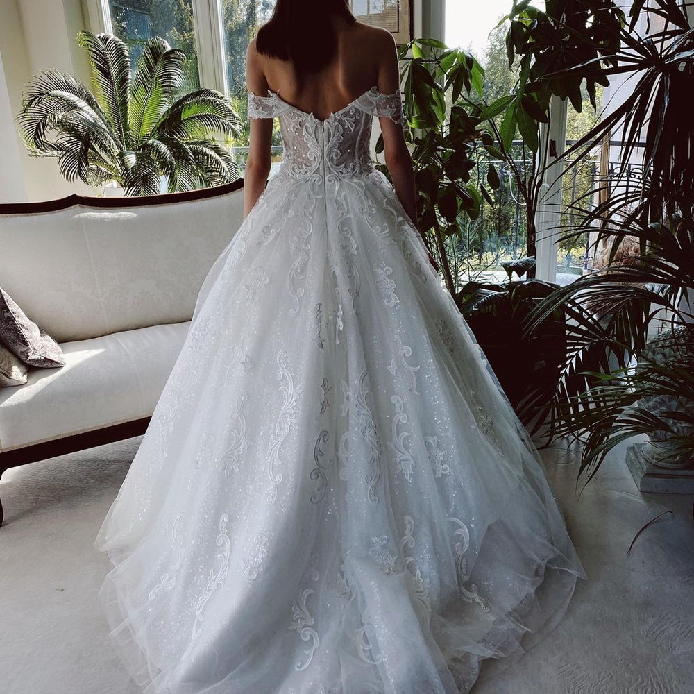 
                      
                        Charming Long A-Line Off-the-Shoulder Tulle Wedding Dress
                      
                    