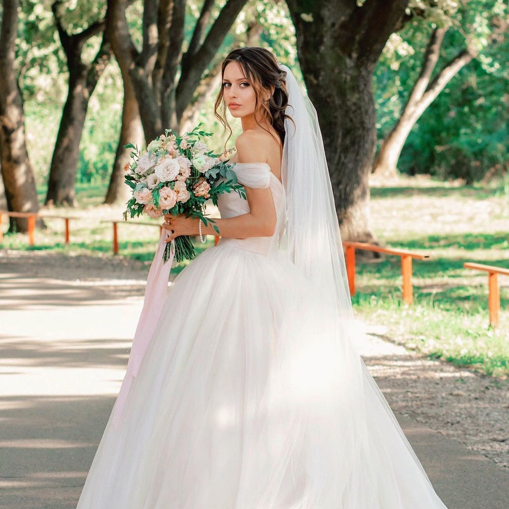 
                      
                        Tulle Off-the-Shoulder A-Line Long Wedding Dress with Chapel Train
                      
                    