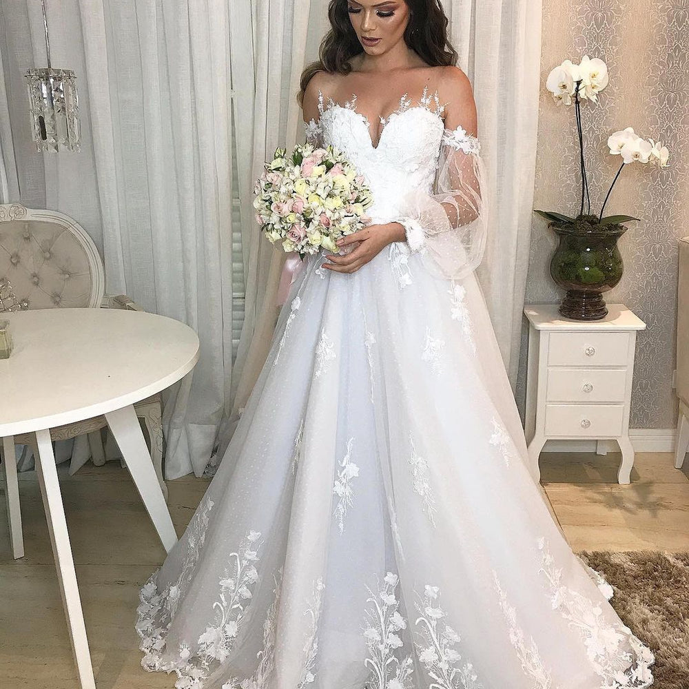 
                      
                        Elegant Long Princess Off-the-Shoulder Wedding Dress with Bubble Sleeves and Tulle
                      
                    