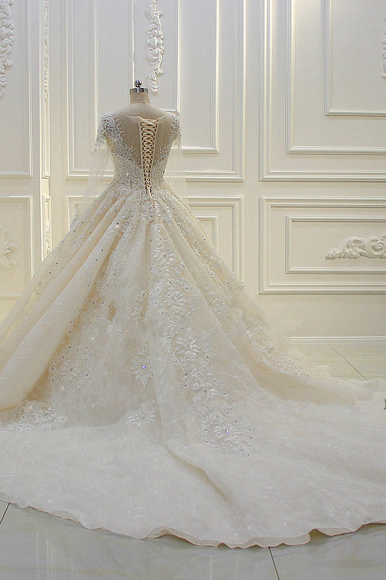 
                      
                        Bateau Long Sleeve Beaded Ball Gown Wedding Dress with Lace Appliques
                      
                    