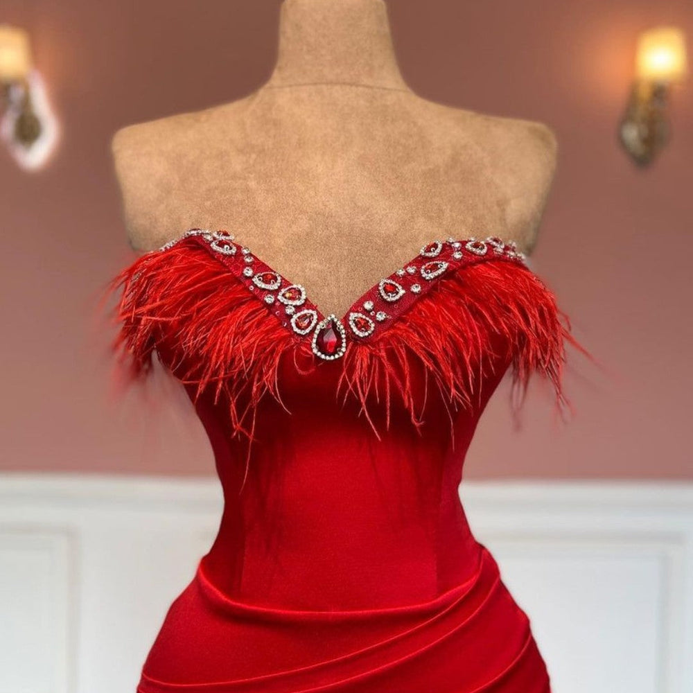 
                      
                        Glamorous Red Satin Prom Gown with Sleeveless Design and Tassel Detailing
                      
                    