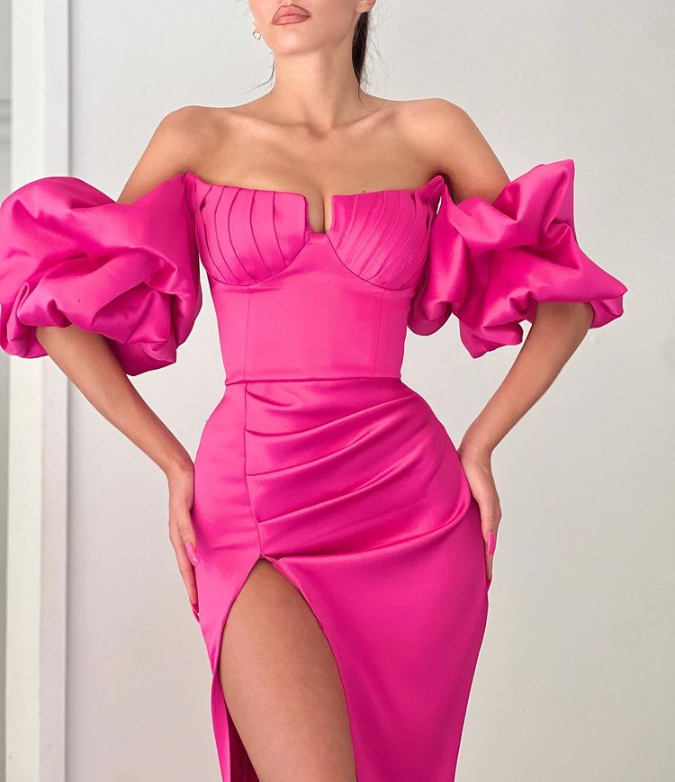 
                      
                        Radiant Fuchsia Mermaid Evening Gown with Off-the-Shoulder Puff Sleeves and Daring Split
                      
                    