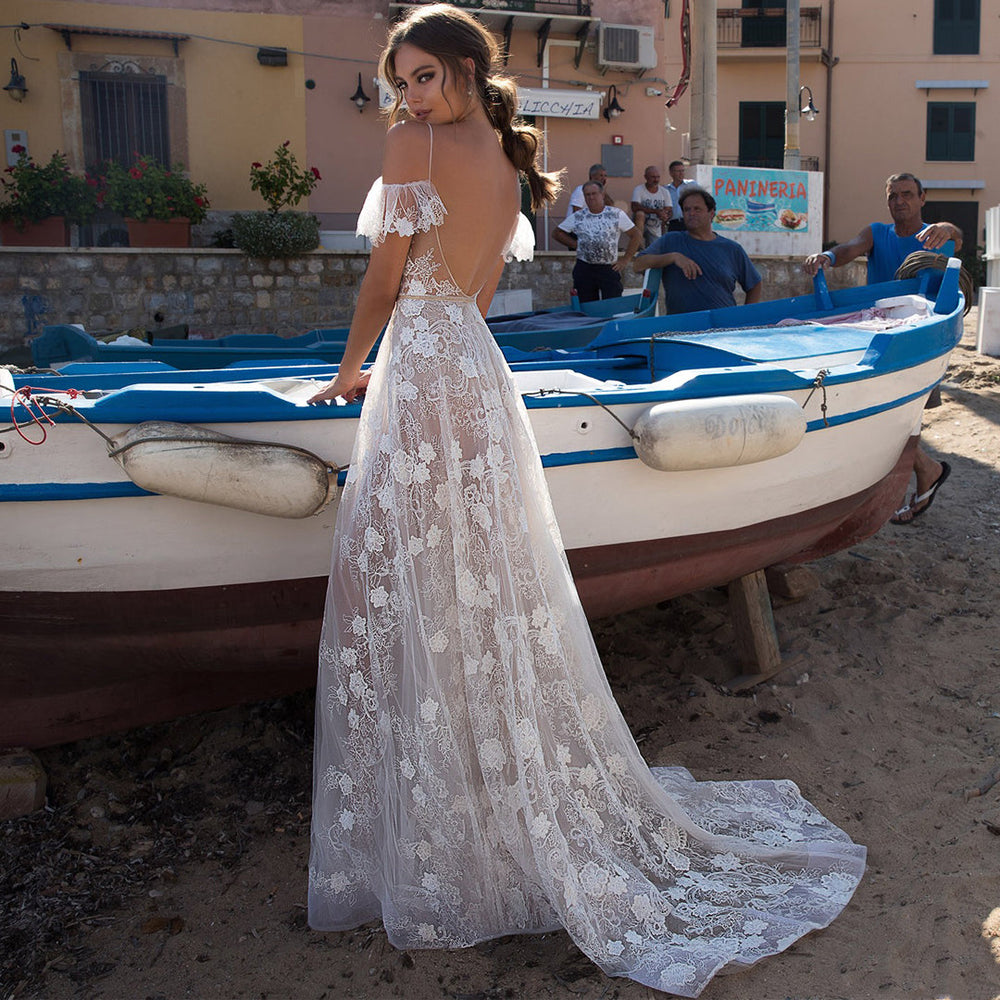 
                      
                        See Through Beach Wedding Dress Spaghetti Straps Lace Bridal Dress
                      
                    