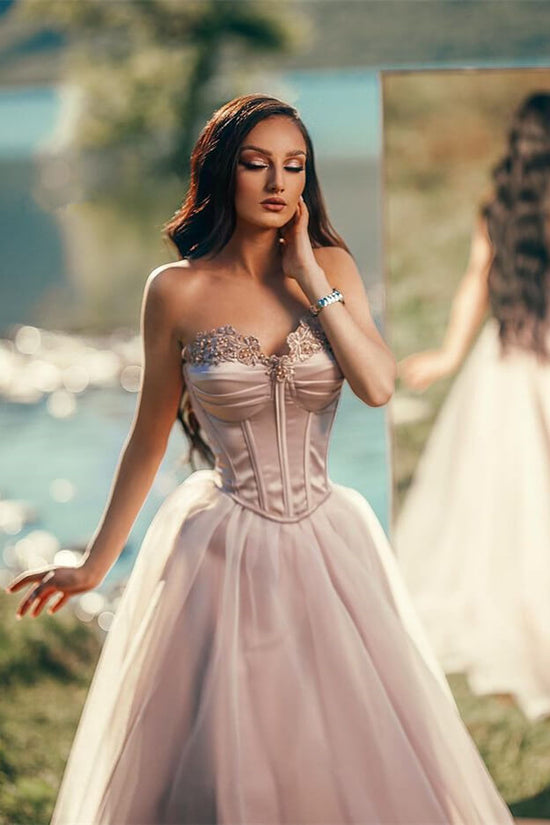 Sleeveless Elegance with Tulle Applique and Pleats