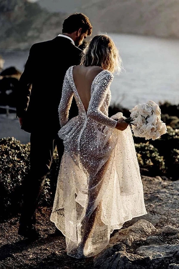 
                      
                        Sparkly See Through Long Sleeve Wedding Dress
                      
                    