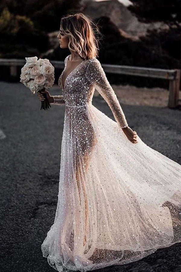 
                      
                        Sparkly See Through Long Sleeve Wedding Dress
                      
                    